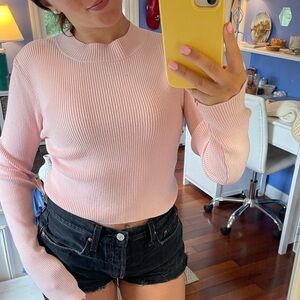 Brandy Melville pink sweater.
